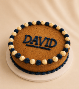 Cookie Cake with buttercream borders, colorful sprinkles, and personalized birthday message by Crumbly NYC